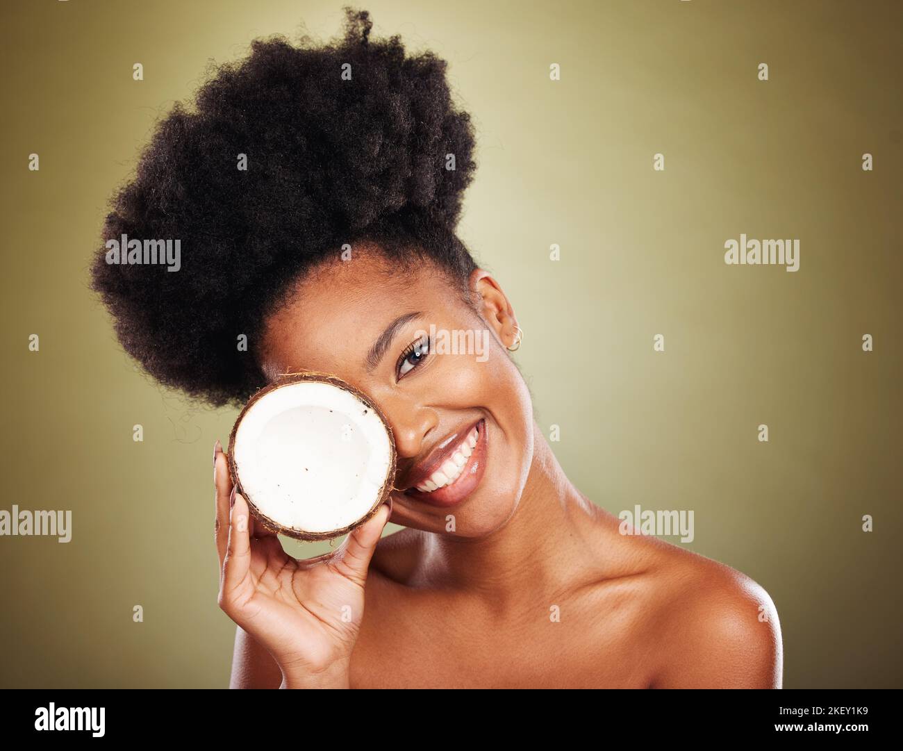 Beauty, skincare and coconut with portrait of black woman for health, moisture and natural cosmetics. Spa, antioxidants and self care with girl model Stock Photo
