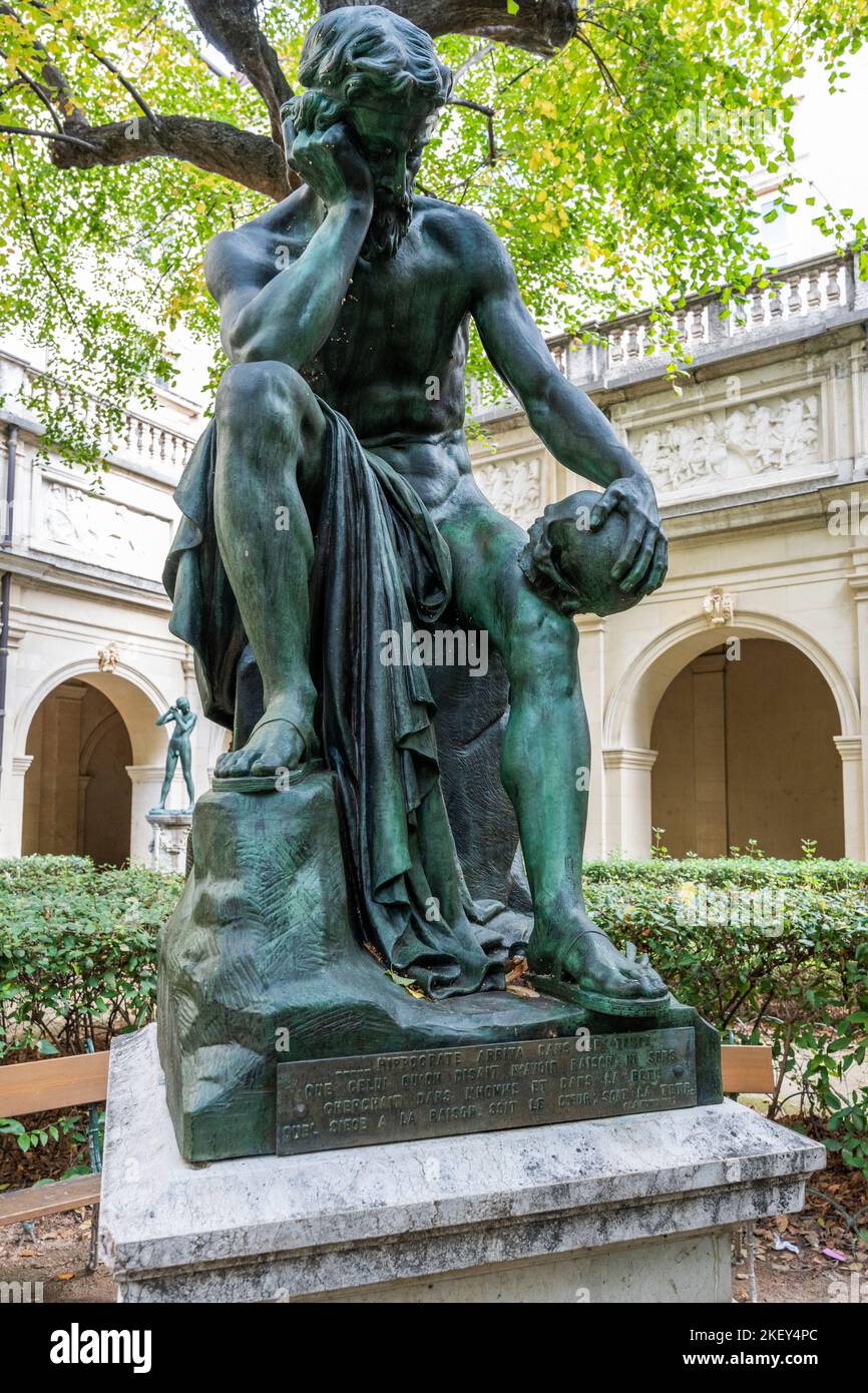 Bronze sculpture of man with skull made by the famous Auguste Rodin Stock Photo
