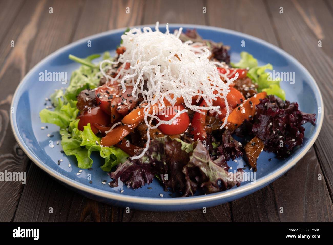 Thai lean beef salad with vegetables and funchose. Restaurant menu Stock Photo