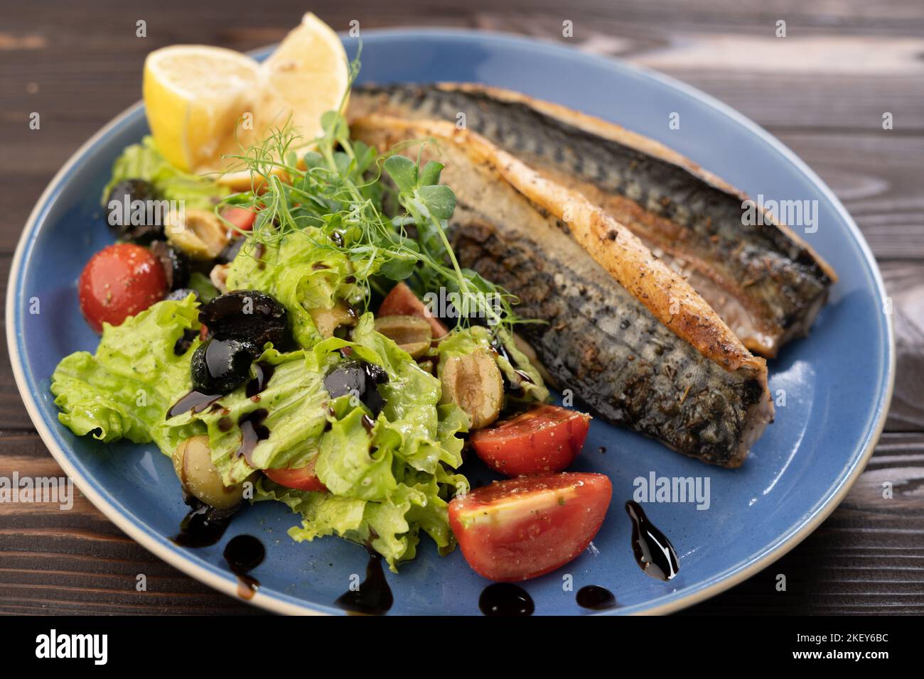 BBQ Grilled mackerel fish with vegetables. Menu recipe concept Stock
