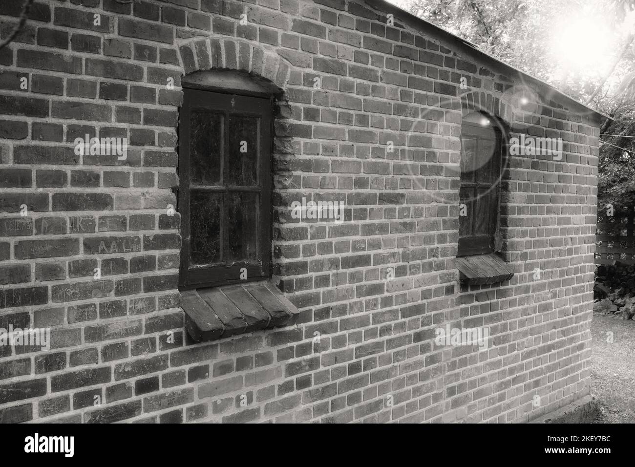 Keeping things in, and keeping things out. a facebrick wall. Stock Photo