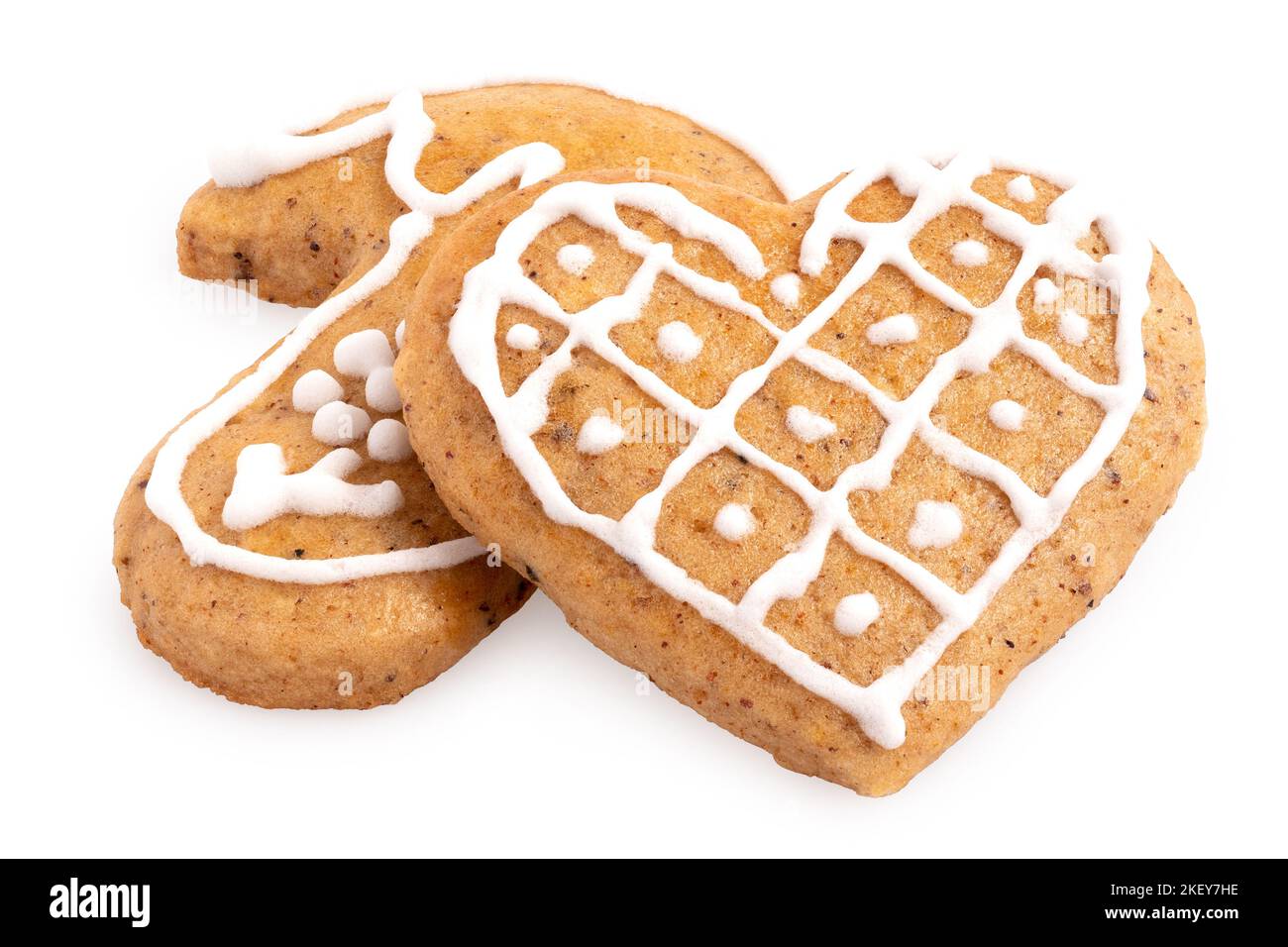 Decorated Christmas gingerbread cookies isolated on white. Stock Photo