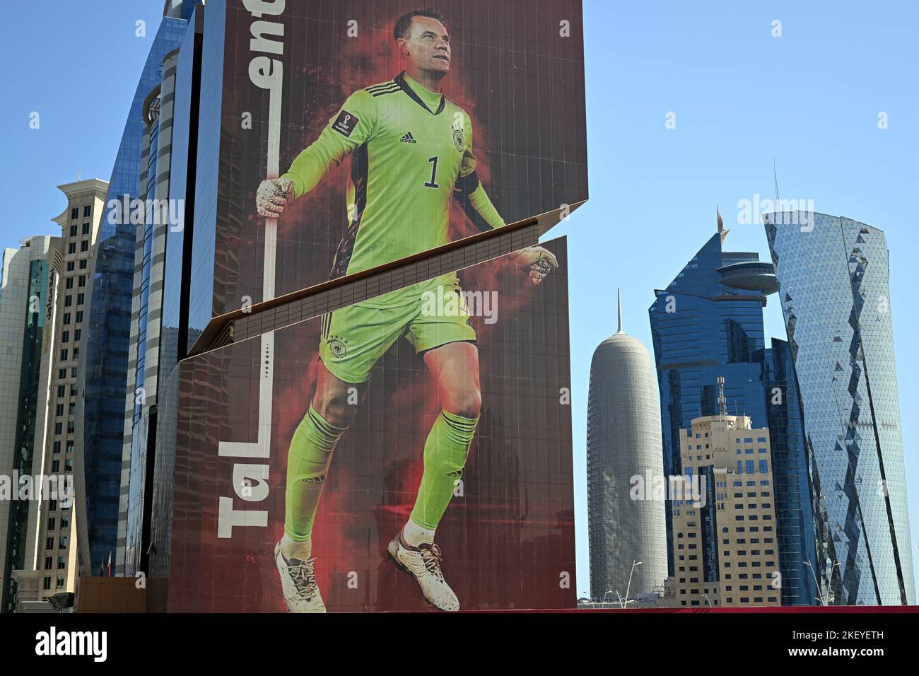 Doha, Qatar. 15th Nov, 2022. Oversized, the German goalkeeper Manuel Neuer is attached to the facade of a building. The opening match between Qatar and Ecuador will kick off the 2022 World Cup on Nov. 20. Credit: Federico Gambarini/dpa/Alamy Live News Stock Photo