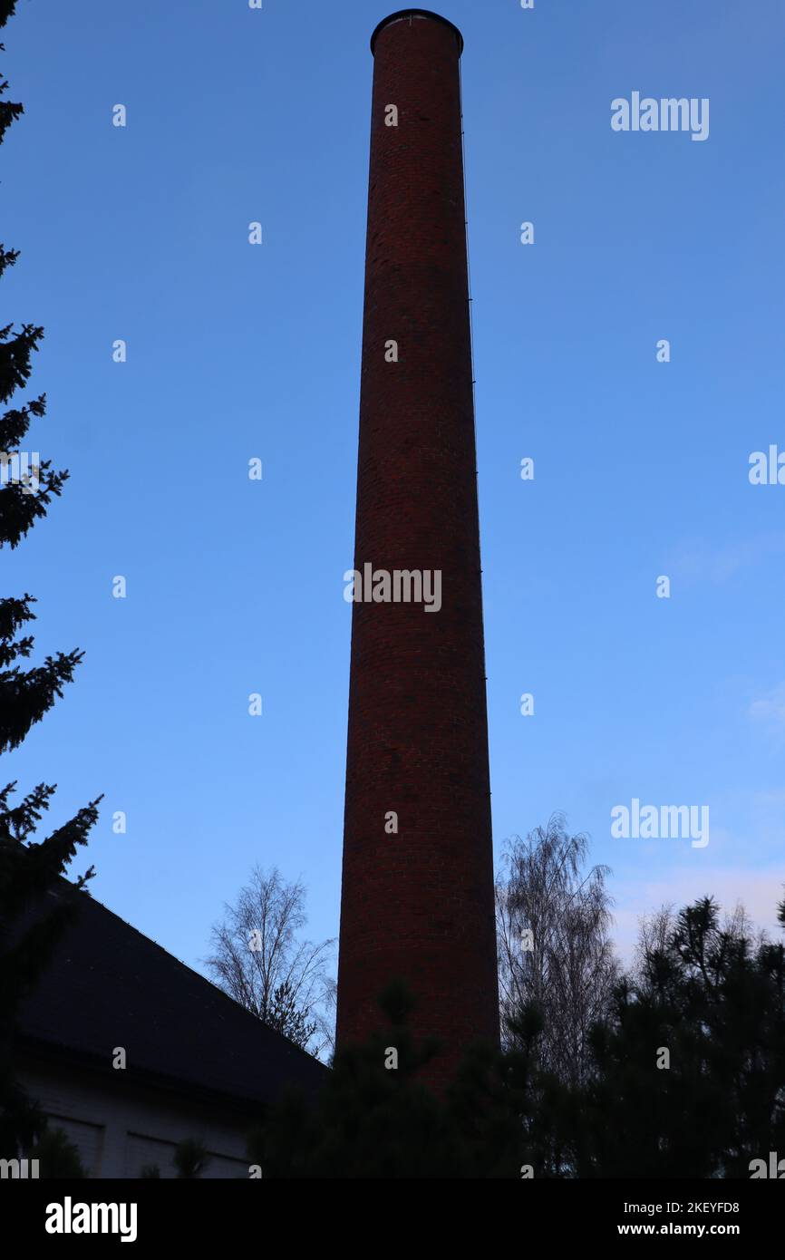 A tall brick chimney Stock Photo