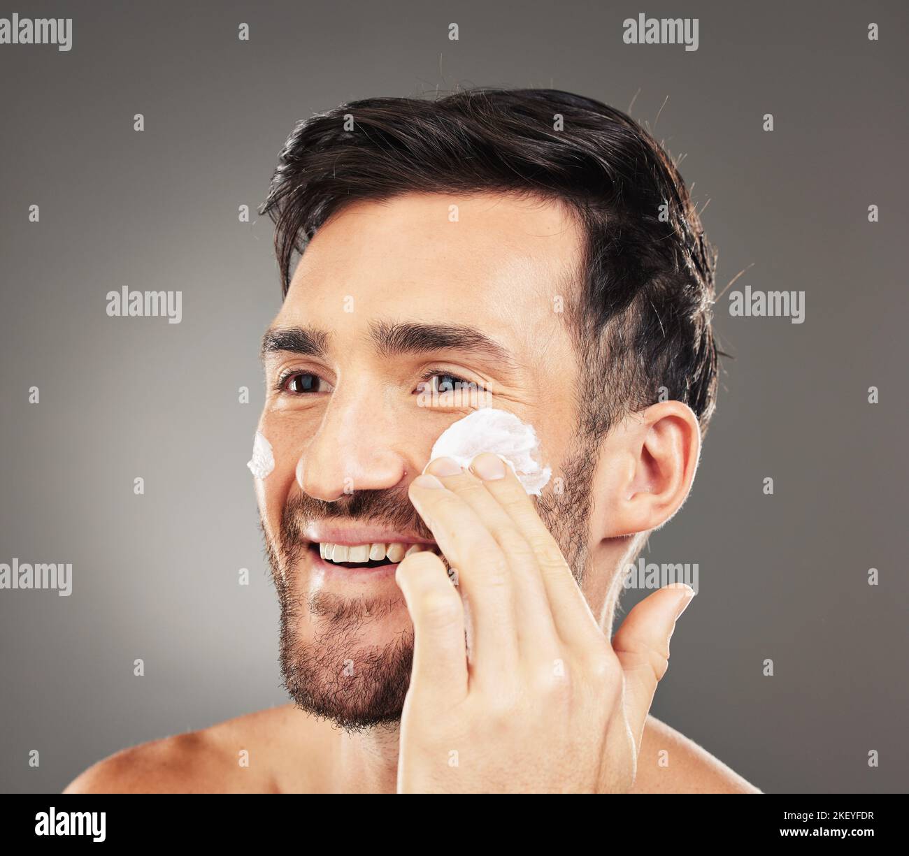Skincare cream, face product and man with with dermatology ointment for acne prevention, beauty or self care. Facial cosmetics, healthcare treatment Stock Photo