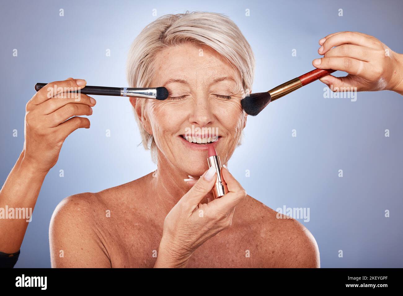 Beauty, brush and senior woman or makeup artist with lipstick, luxury