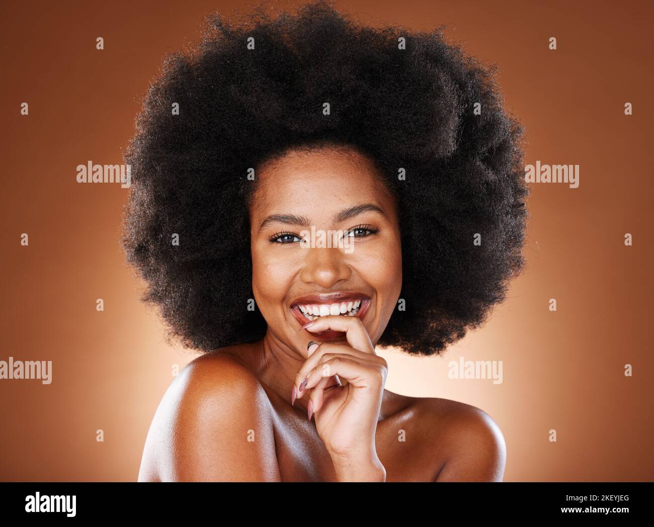Happy, black woman and hair care with smile, skincare and with afro