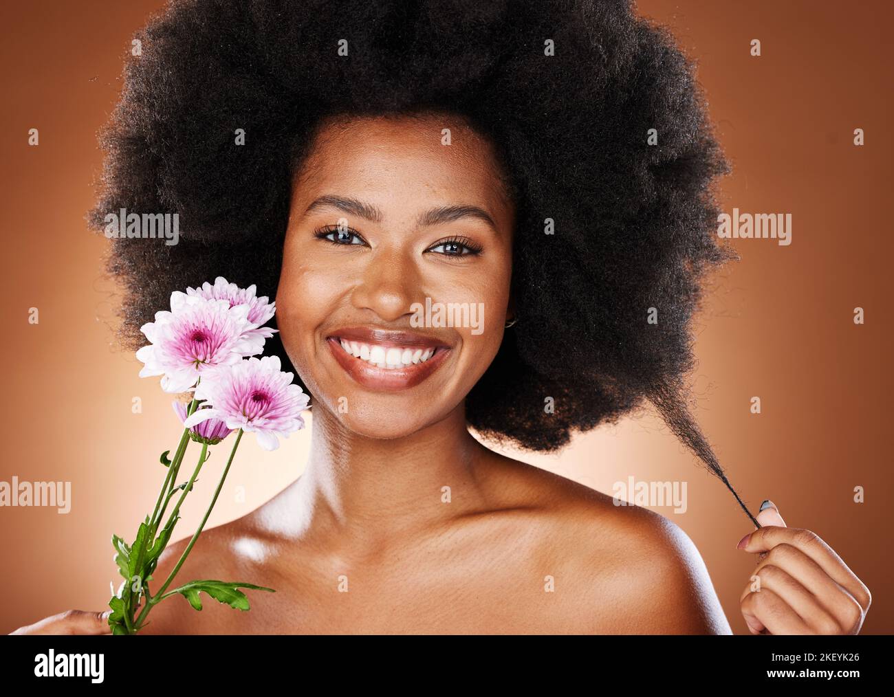 Flower, beauty and hair care of a black woman portrait with skin glow