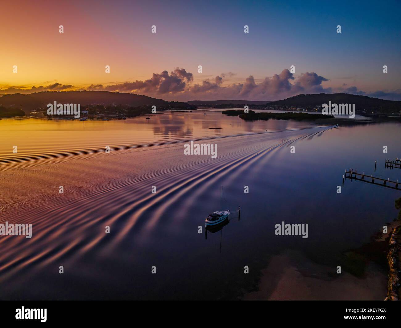 Aerial sunrise waterscape at the waterfront in Woy Woy on the Central Coast, NSW, Australia. Stock Photo