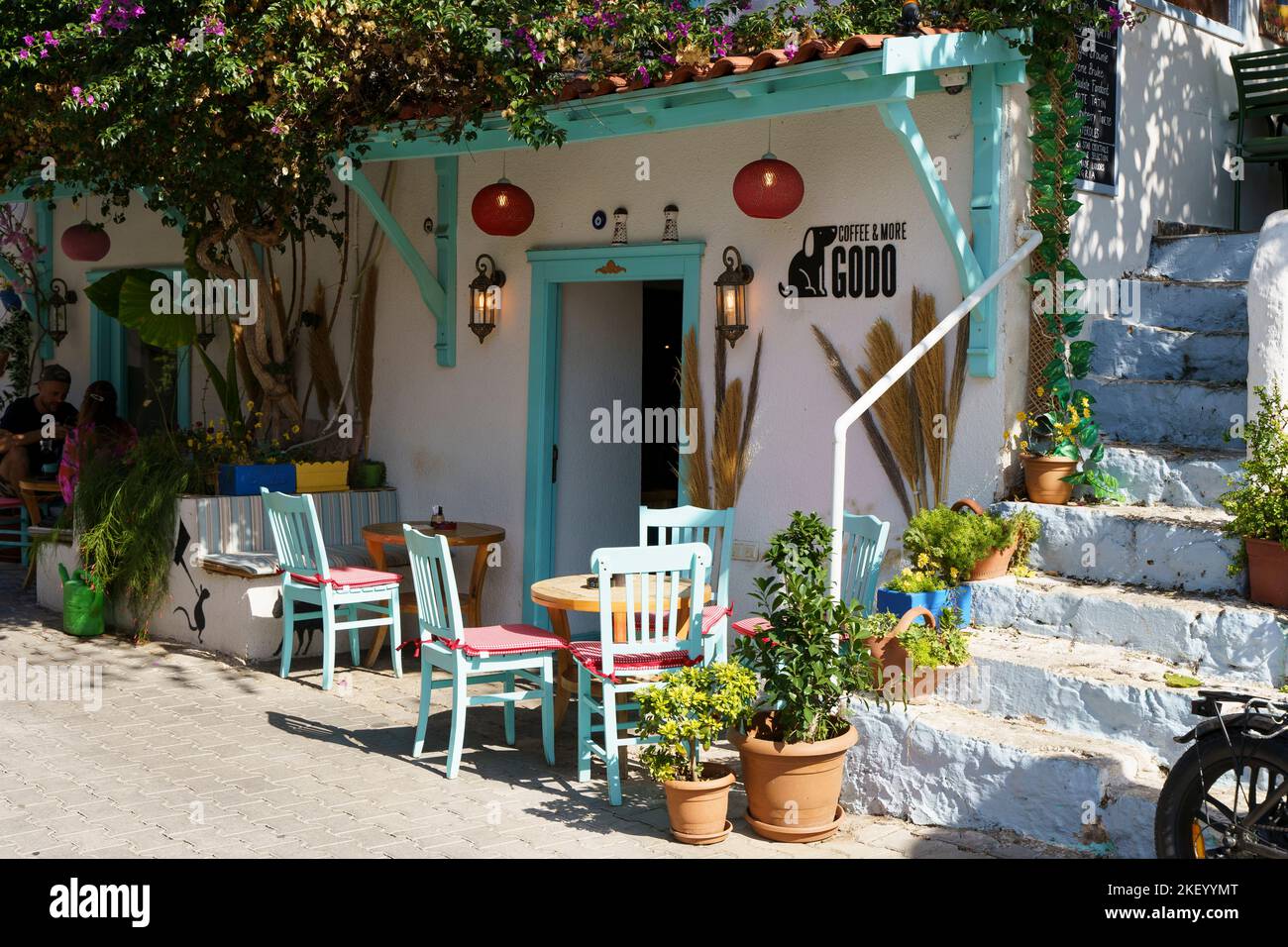 Kash, Turkey - November 14, 2022: Cafes and restaurants on the walking streets of the Turkish tourist city of Kas on the coast of the Mediterranean Sea. High quality photo Stock Photo