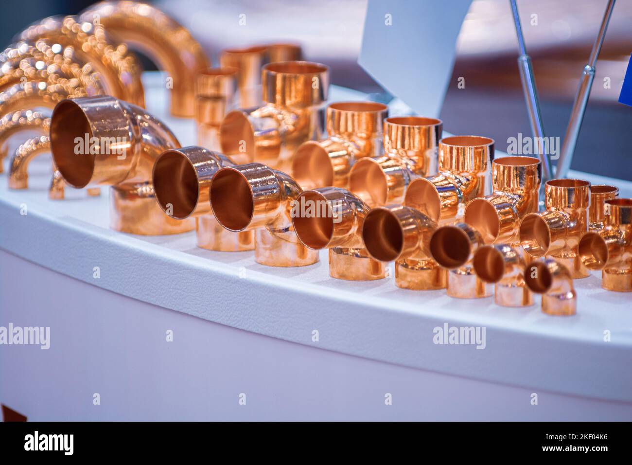 Copper pipe fittings. Set of connecting angle pipes made of copper