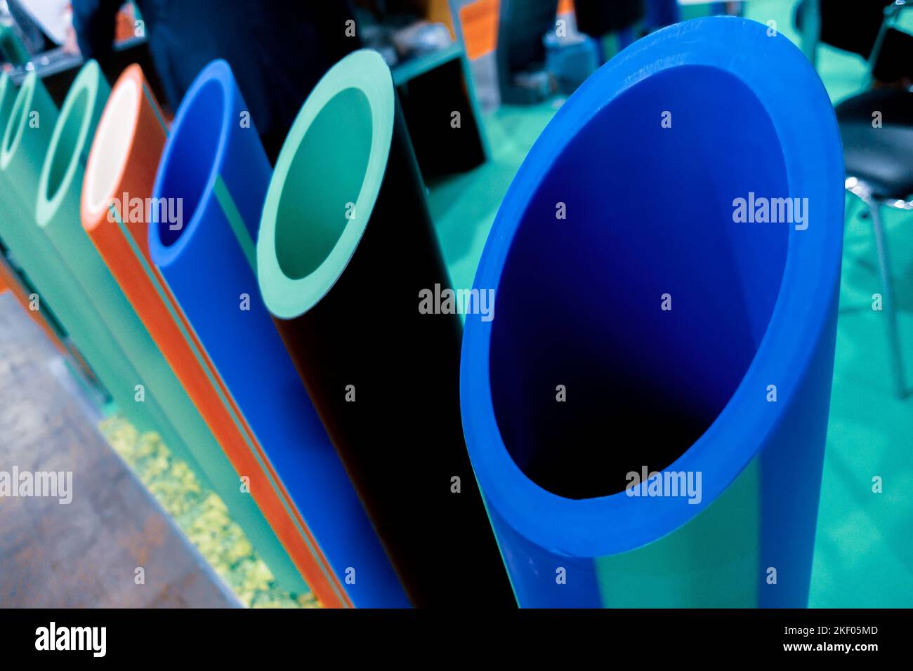 Cross-section of multicolored large diameter plastic pipes. Stock Photo