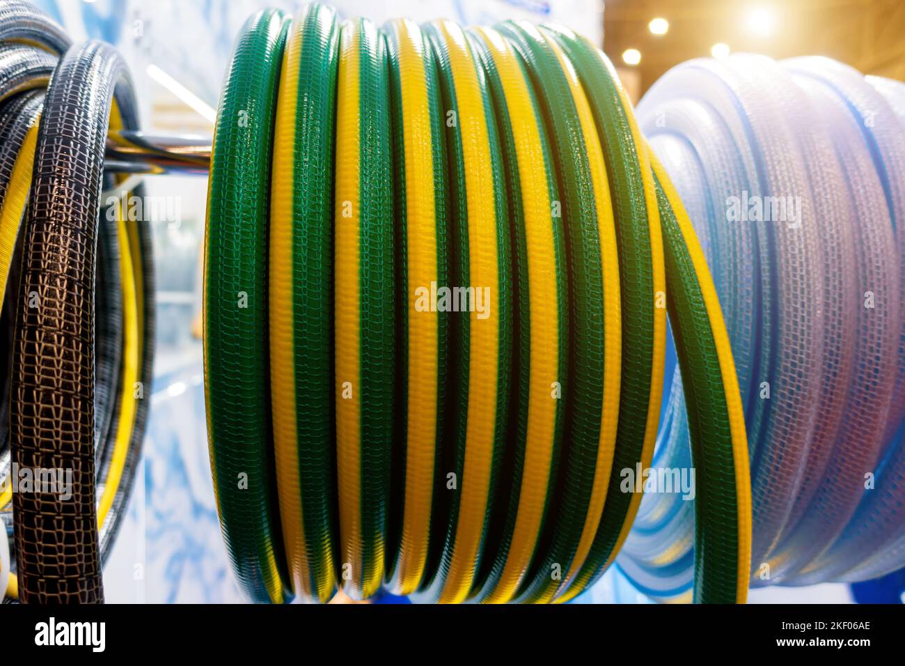 Roll of flexible hose rings. Flexible hose wrapped around the wheel