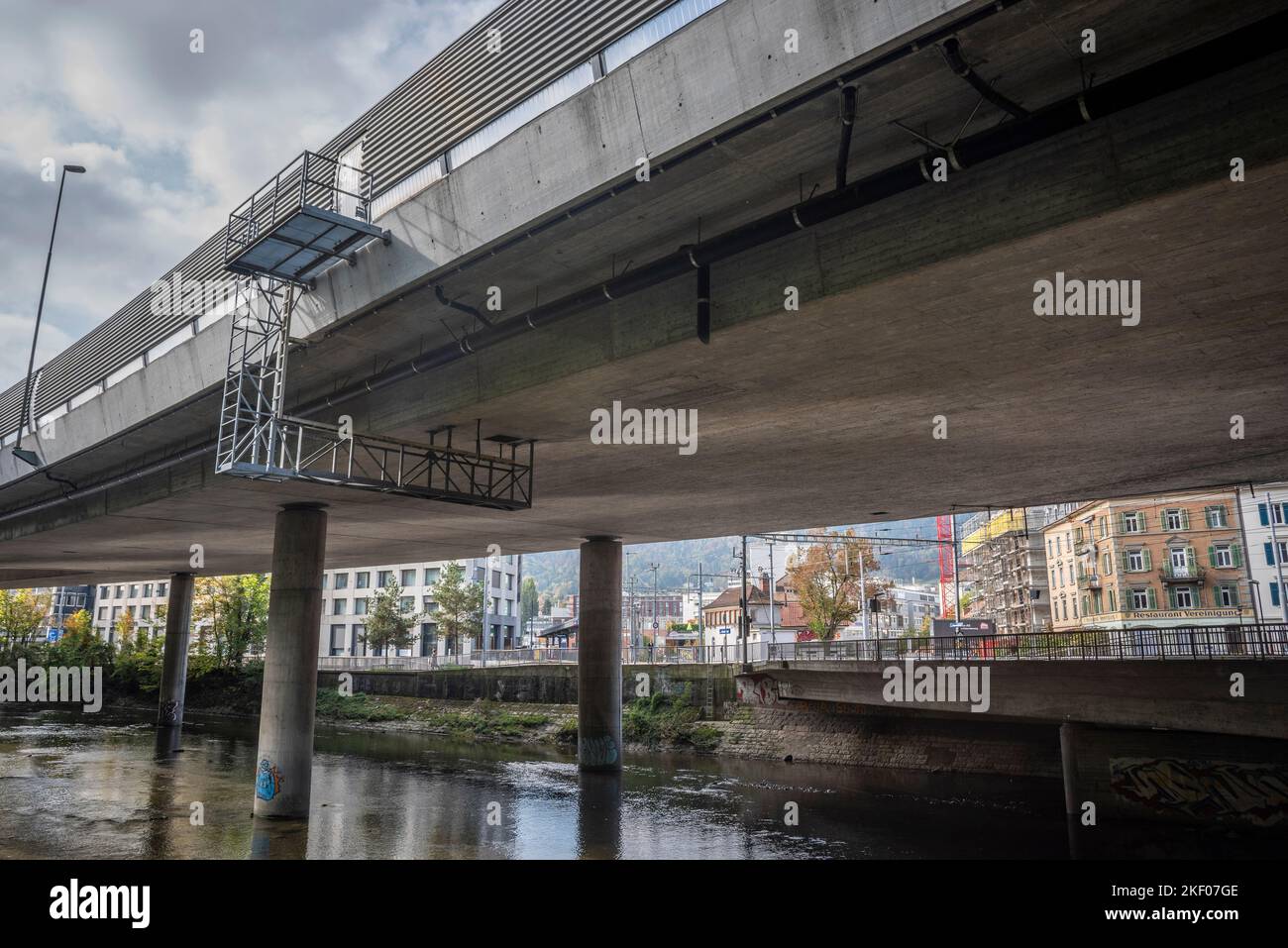 A dual carriageway following directly overhead the River Sihl, Zurich, Switzerland Stock Photo