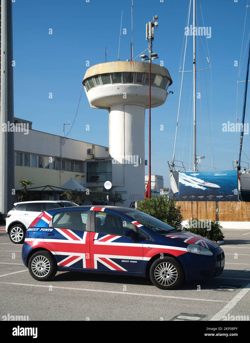This Fiat Punto car has been converted into a Brexit Punto. Evidently everything makes a show. Touristic Port of Cervia, Italy. Stock Photo