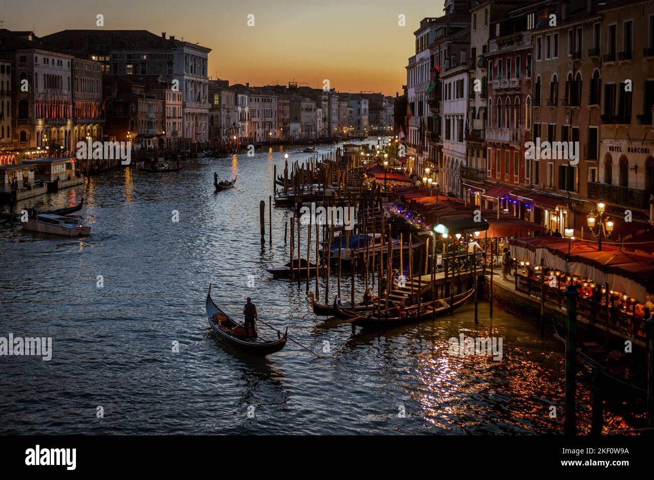 Traditional Venetian row boats gondolas on Grand Canal in Venice, Italy Stock Photo