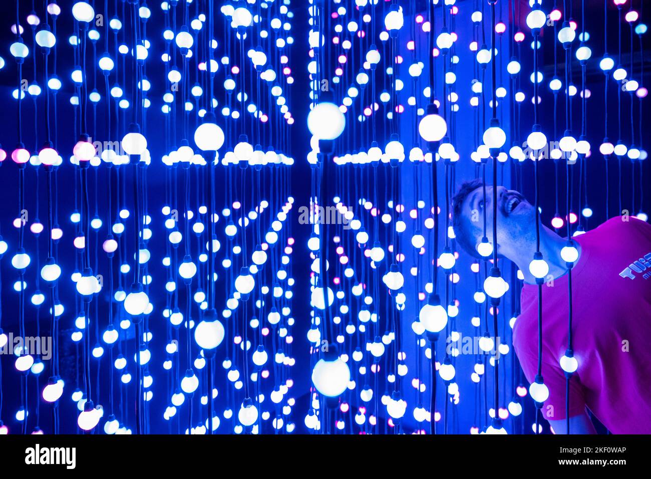 London, UK. 15 November 2022. A staff member interacts with an LED