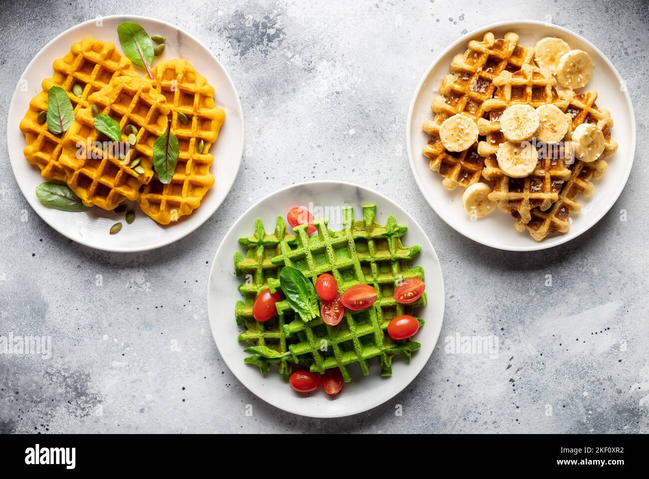 different types of Belgian waffles on gray background Stock Photo Alamy
