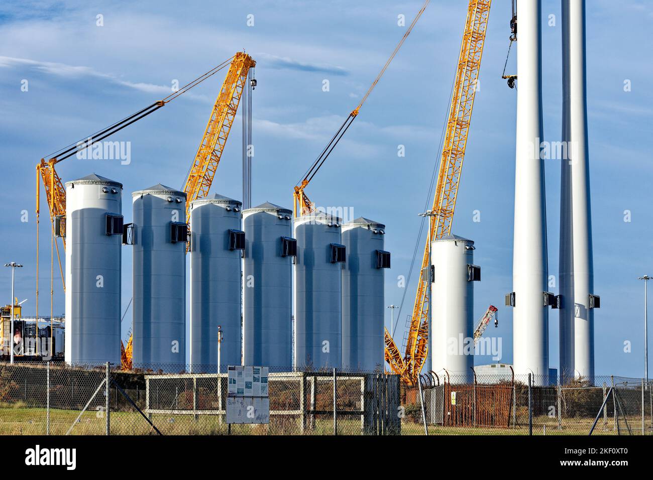 Cromarty Firth Scotland Nigg large metal tubular parts for off shore wind turbines Stock Photo