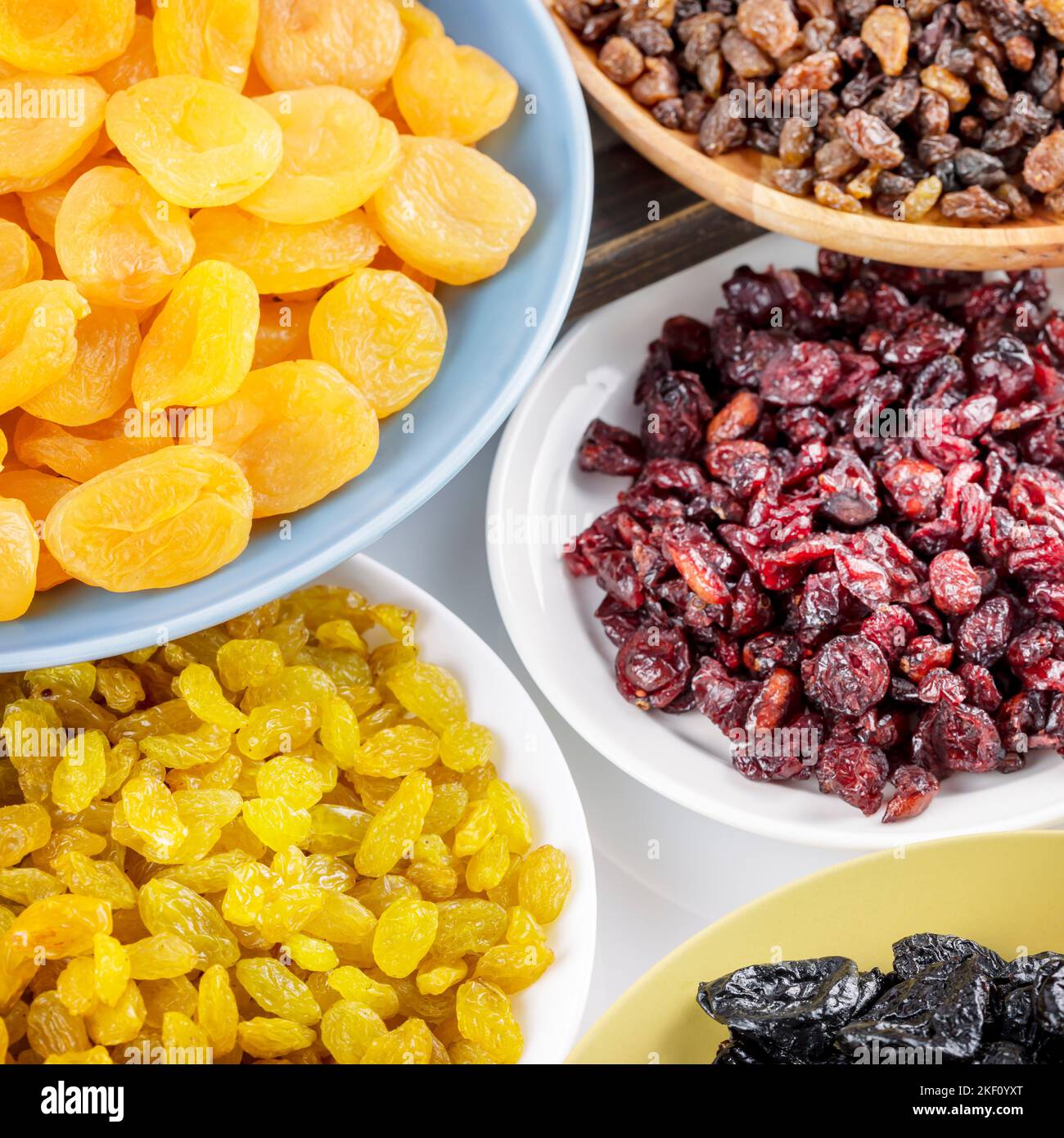 Dry fruits assortment. Dried apricots, cranberries, raisins, and prunes