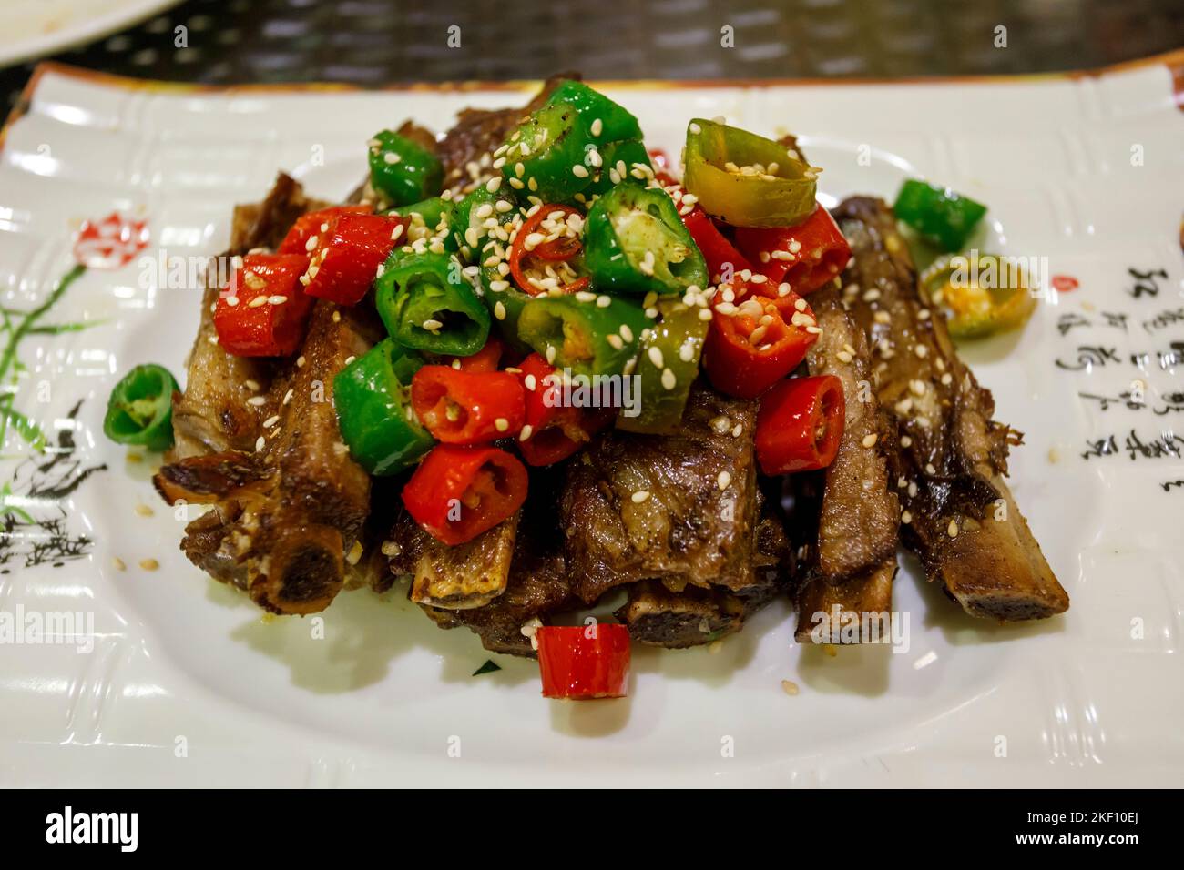Plate of pork ribs fried with chili, Chinatown, Singapore Stock Photo