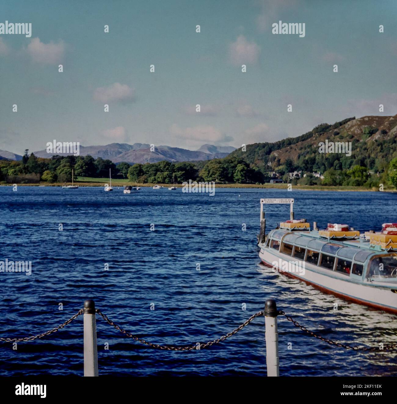 Lake Windermere in 1980. The passenger cruiser is about to set off taking people across the lake. This is a photo of the original slide taken in 1980. Stock Photo