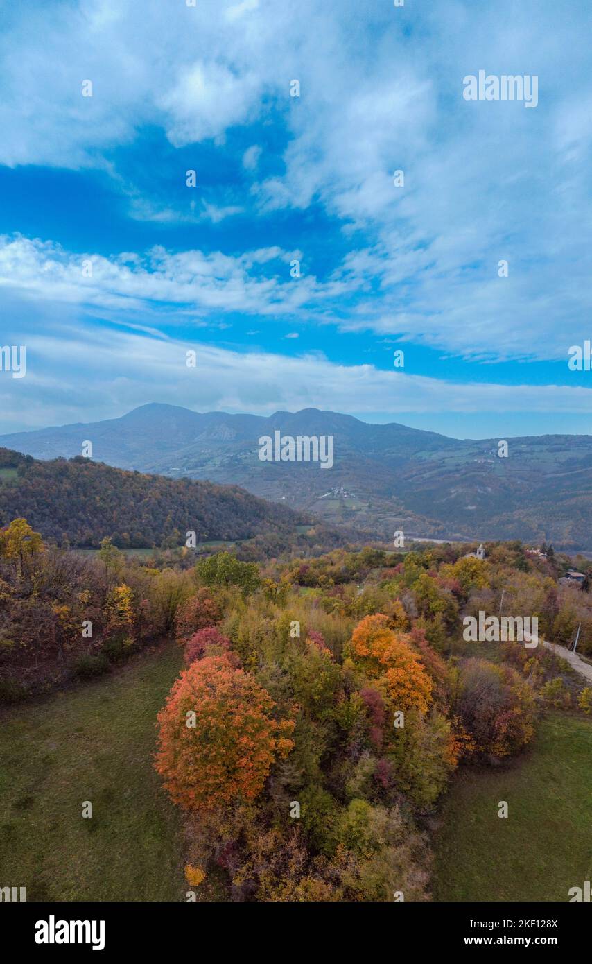 Vezzolacca Piacenza Italy scenic drone aerial view of autumn coloured tress forest Stock Photo