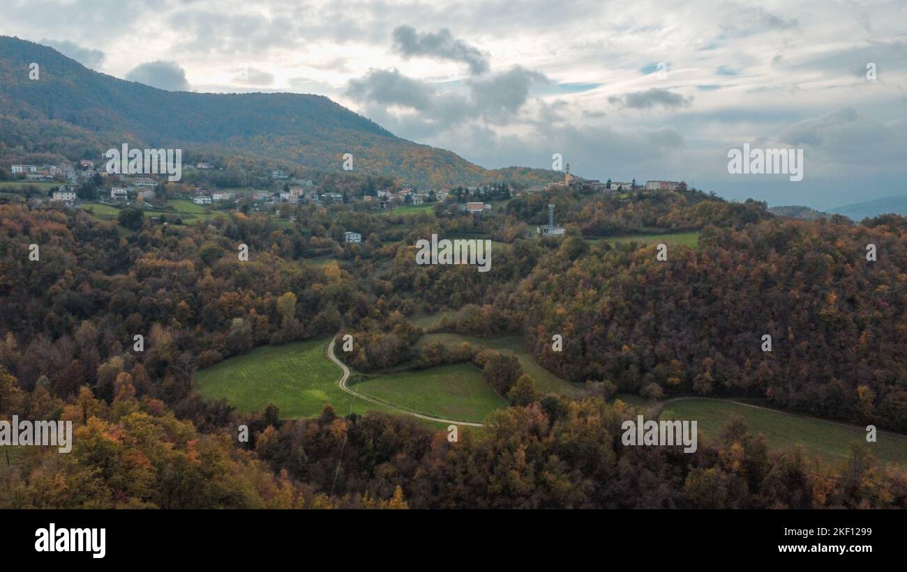 Vezzolacca Piacenza Italy scenic drone aerial view of autumn coloured tress forest Stock Photo