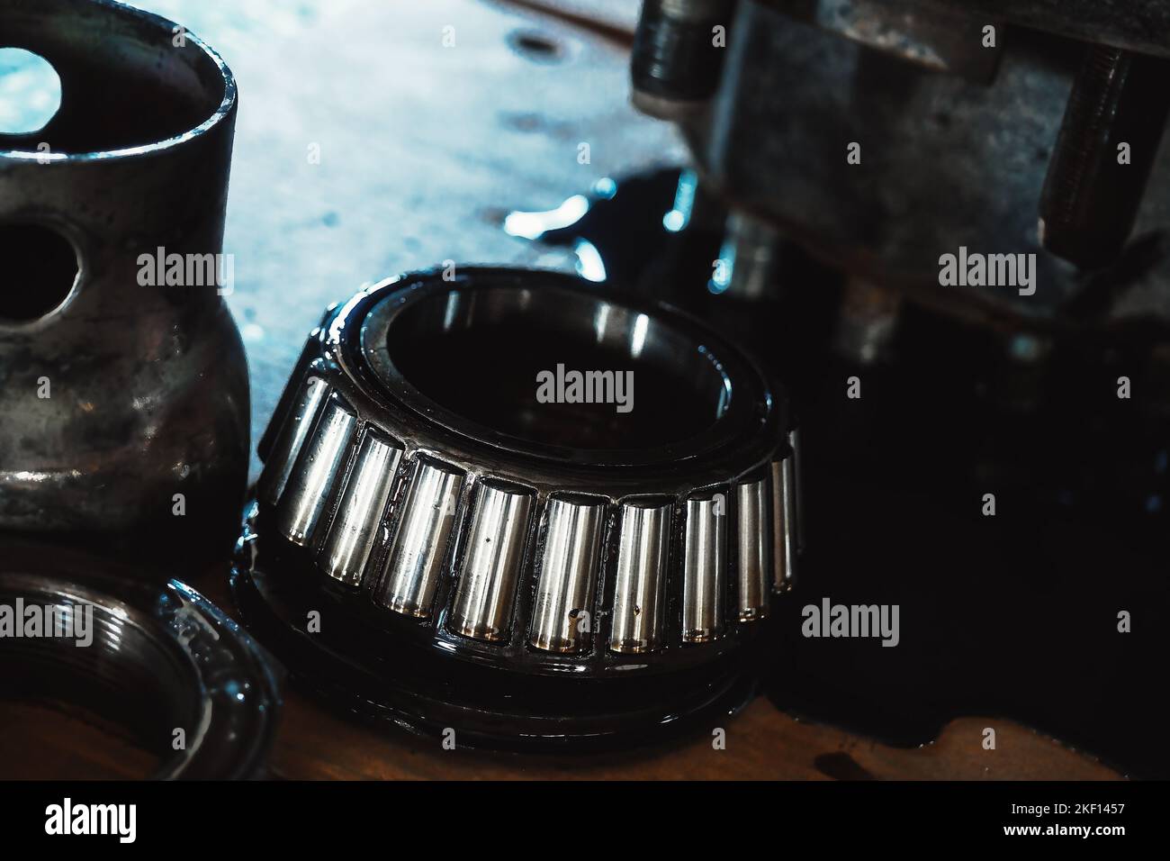 Lubricated roller bearing. Truck suspension repair part. Closeup