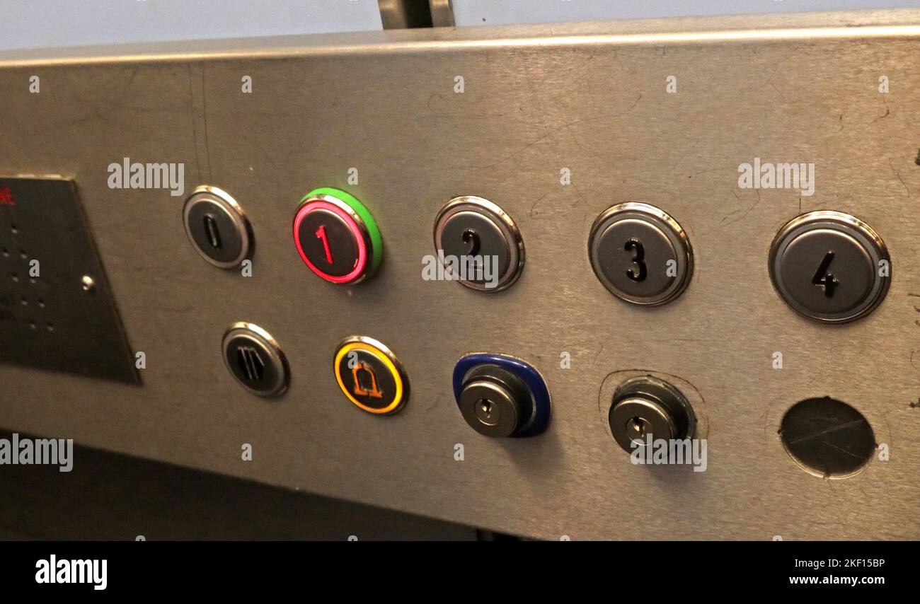 Passenger lift controls, in medium level block of flats Stock Photo