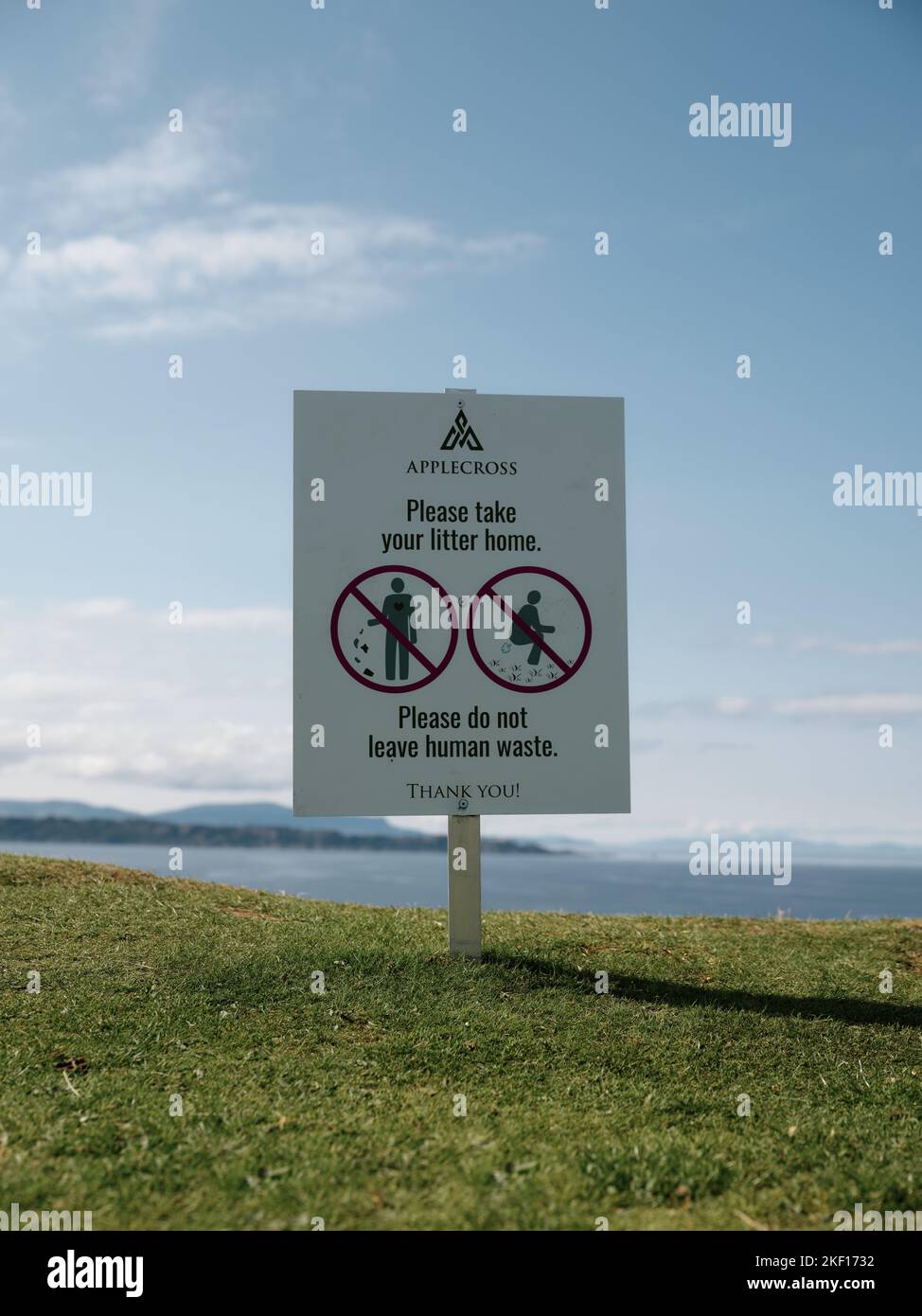 Please take your litter home - do not leave human waste sign in the west coast Scotland summer landscape - overtourism tourist problem Stock Photo