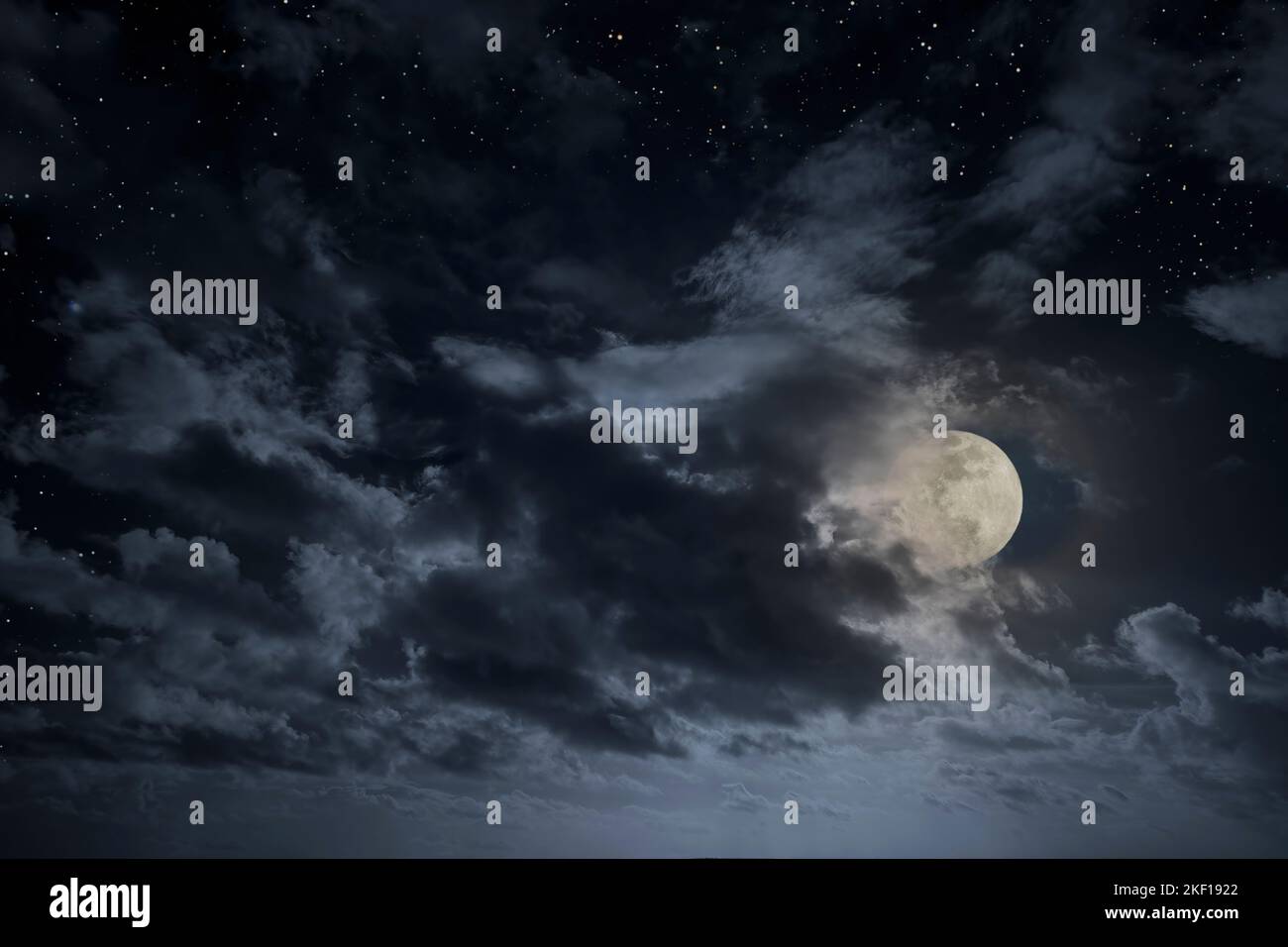 Cloudy full moon night sky with stars Stock Photo - Alamy