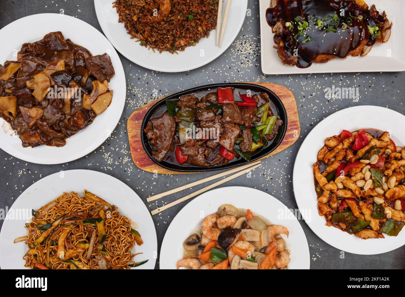 Assorted Chinese food. Chinese noodles, fried rice, dumplings, roast