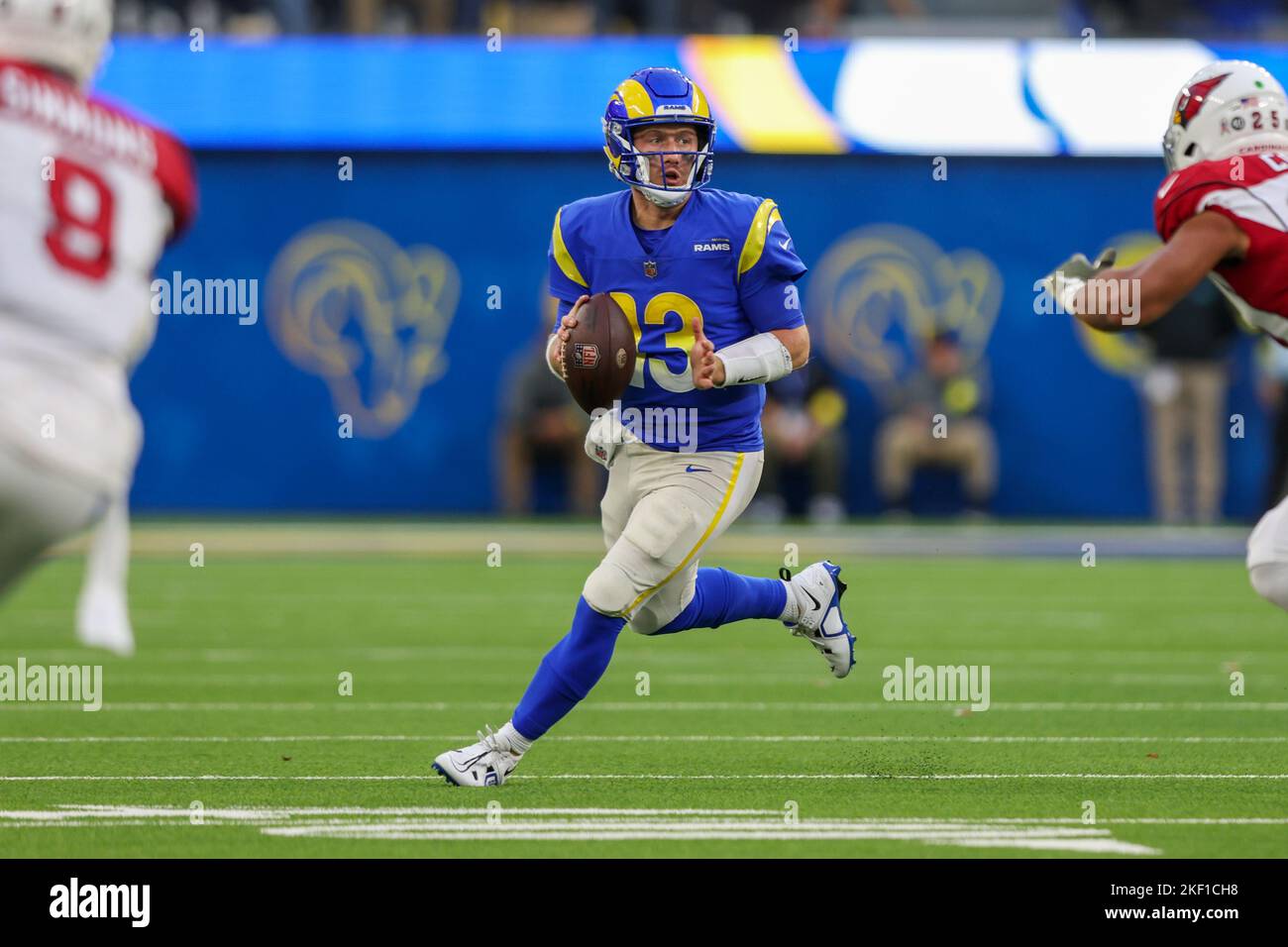 Los Angeles Rams quarterback John Wolford 13 rolls out of the