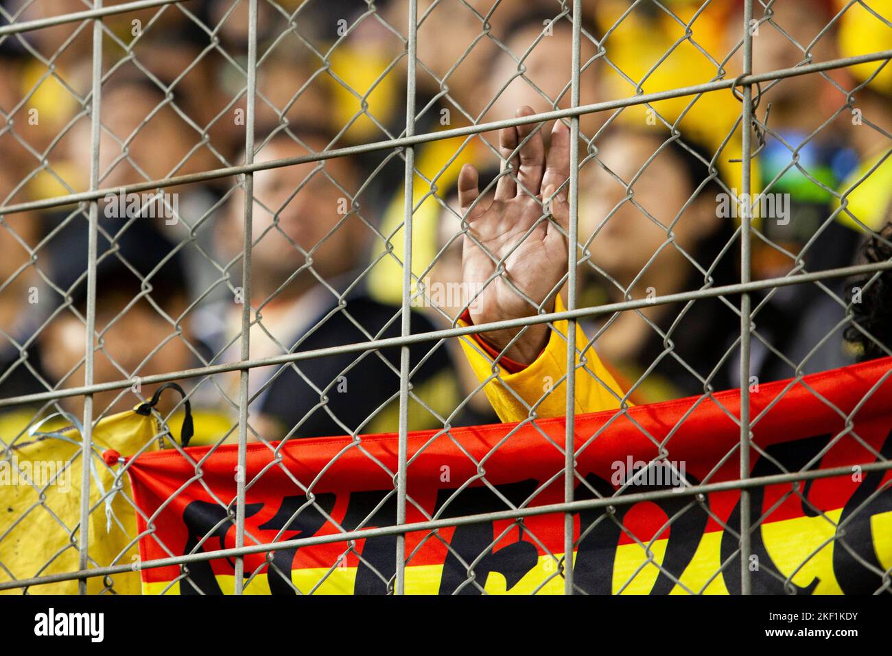 Quito, Ecuador - Ligapro final 2022 Aucas vs Barcelona SC. Barcelona sporting fans hand on the railing during visiting game of the championship final Stock Photo