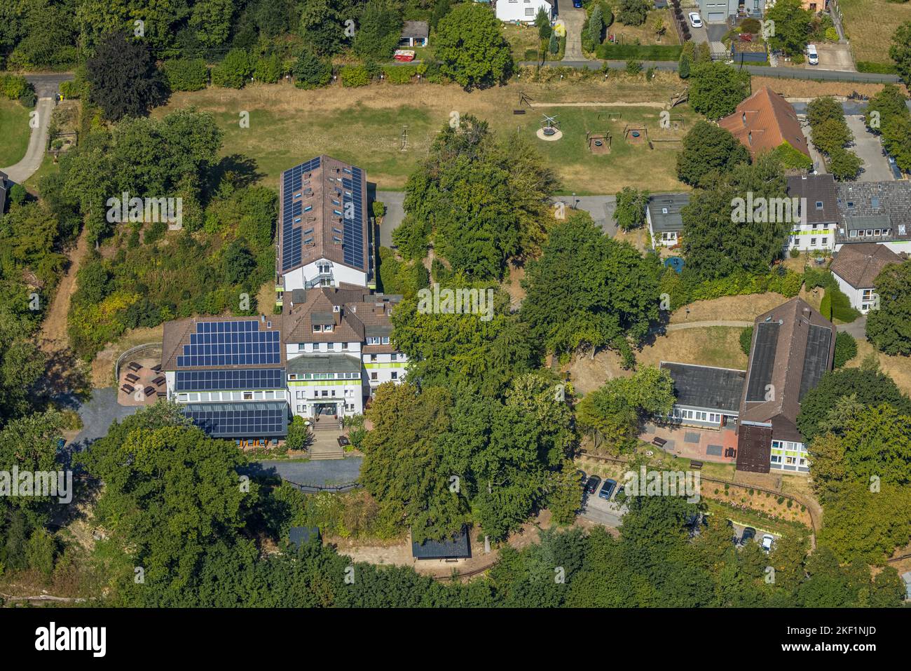 Aerial view, Haus Friede - EC guesthouse and conference center, solar roof, Oberbredenscheid, Hattingen, Ruhr area, North Rhine-Westphalia, Germany, D Stock Photo