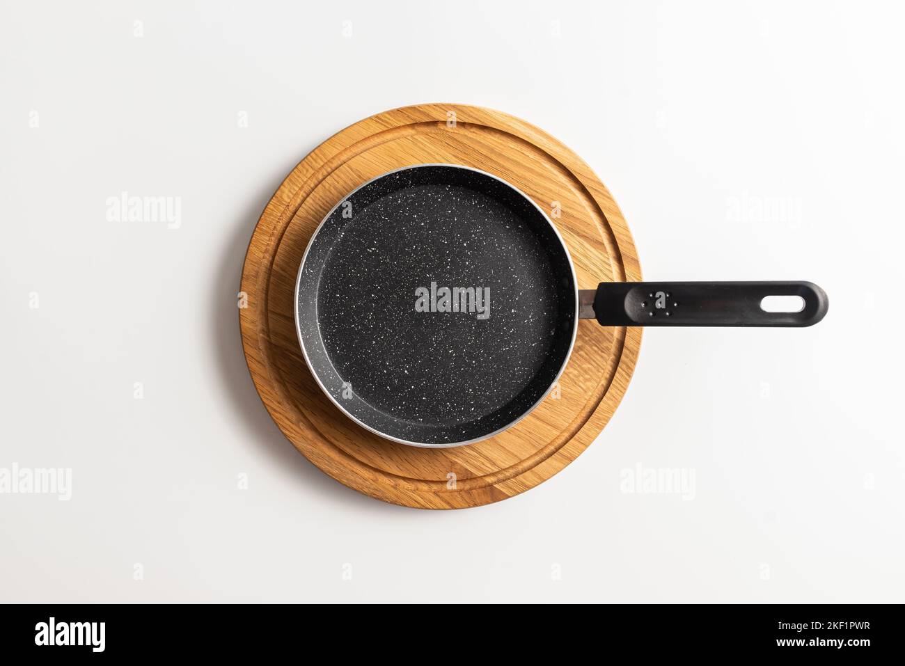Empty pan on wood board. pan for pancake Stock Photo