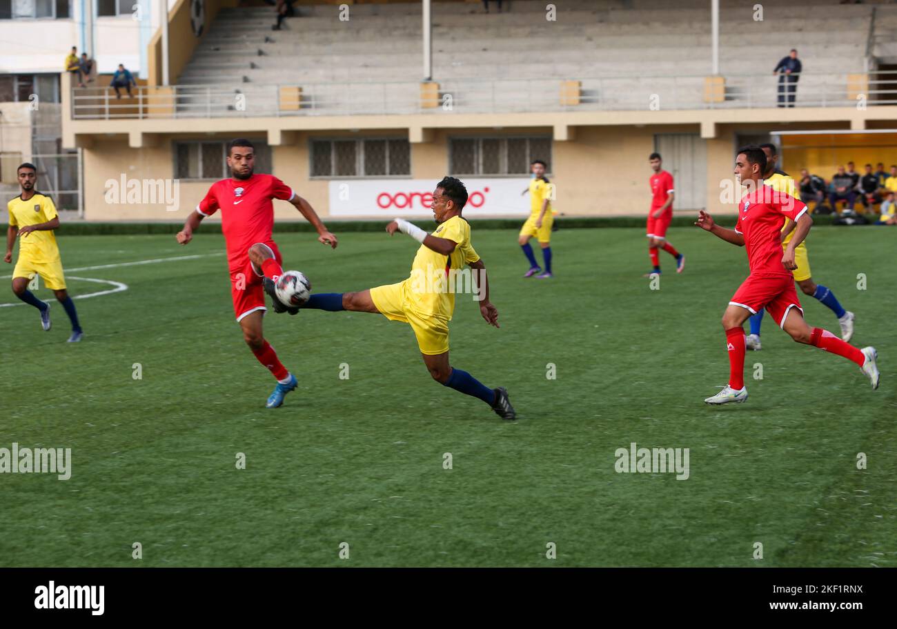 Players of Rafah youth club pose a 'Ecuador's' team match against the Khan Yunis Union Club, playing as 'Qatar's' team, in a mock World Cup 2022 Qatar Stock Photo