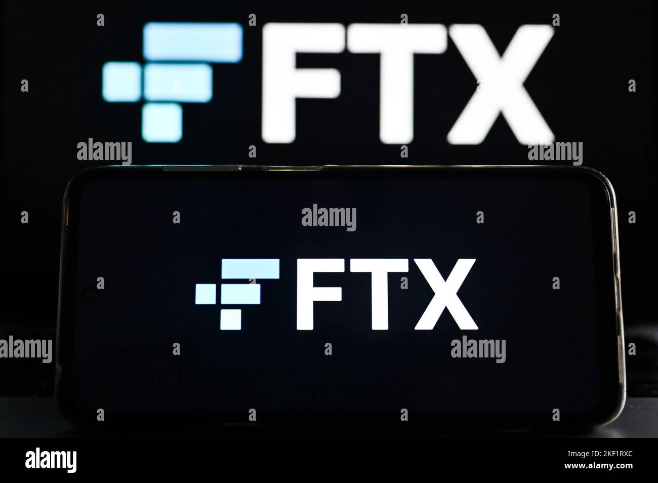 Poland. 15th Nov, 2022. In this photo illustration FTX logo is displayed on a smartphone screen and in the background. (Credit Image: © Omar Marques/SOPA Images via ZUMA Press Wire) Stock Photo