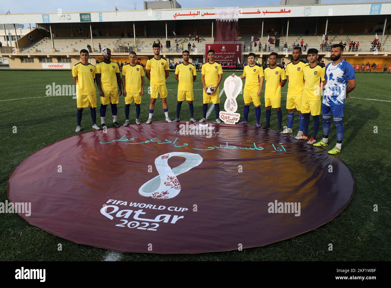 Players of Rafah youth club pose a 'Ecuador's' team match against the Khan Yunis Union Club, playing as 'Qatar's' team, in a mock World Cup 2022 Qatar Stock Photo