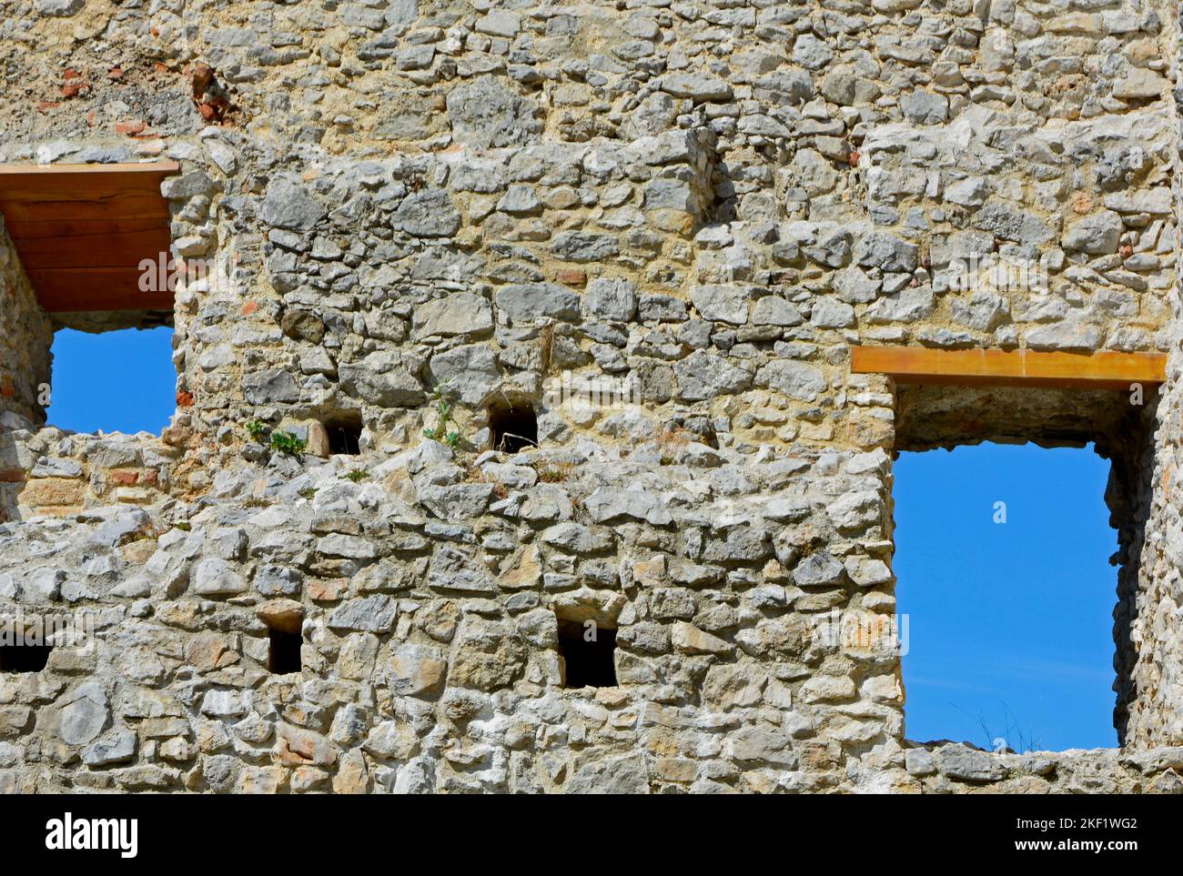 Old window in a stone wall hi-res stock photography and images - Alamy