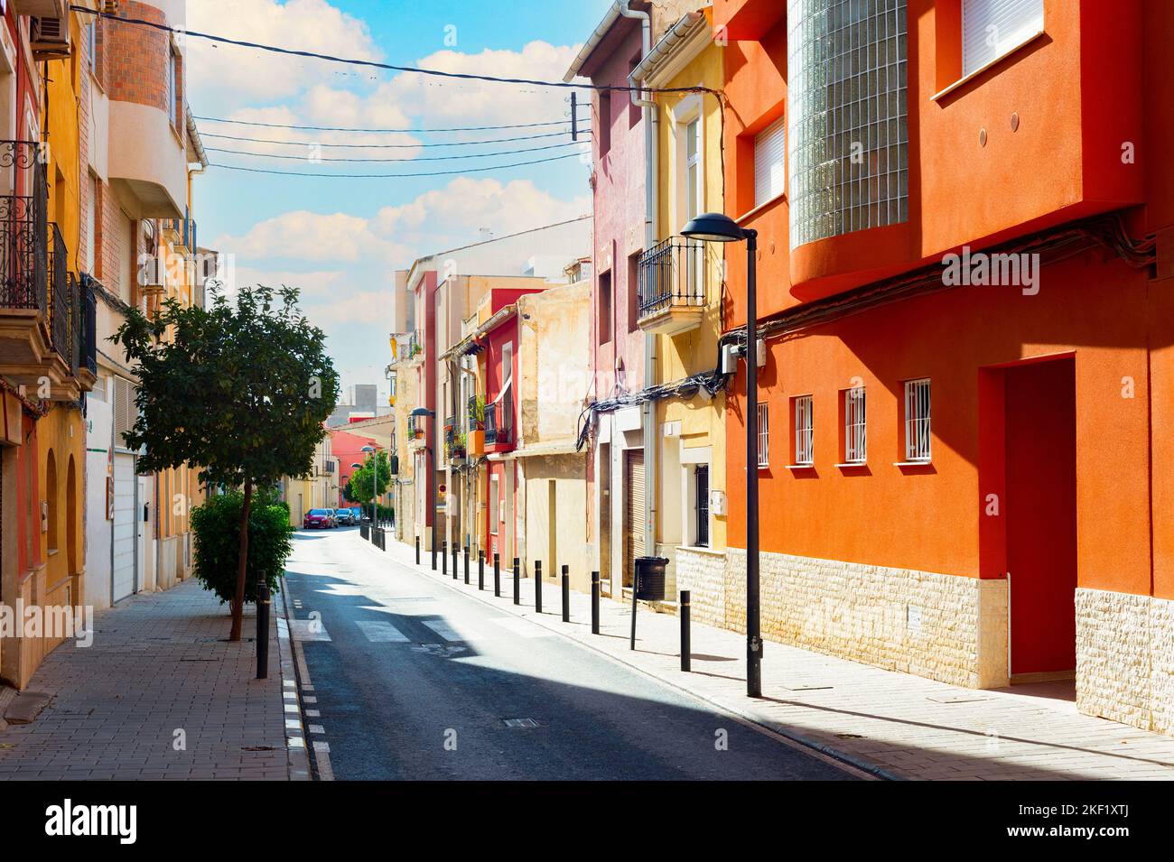 Street with traditional architecture of Mediterranean region, Alicante, Spain Stock Photo