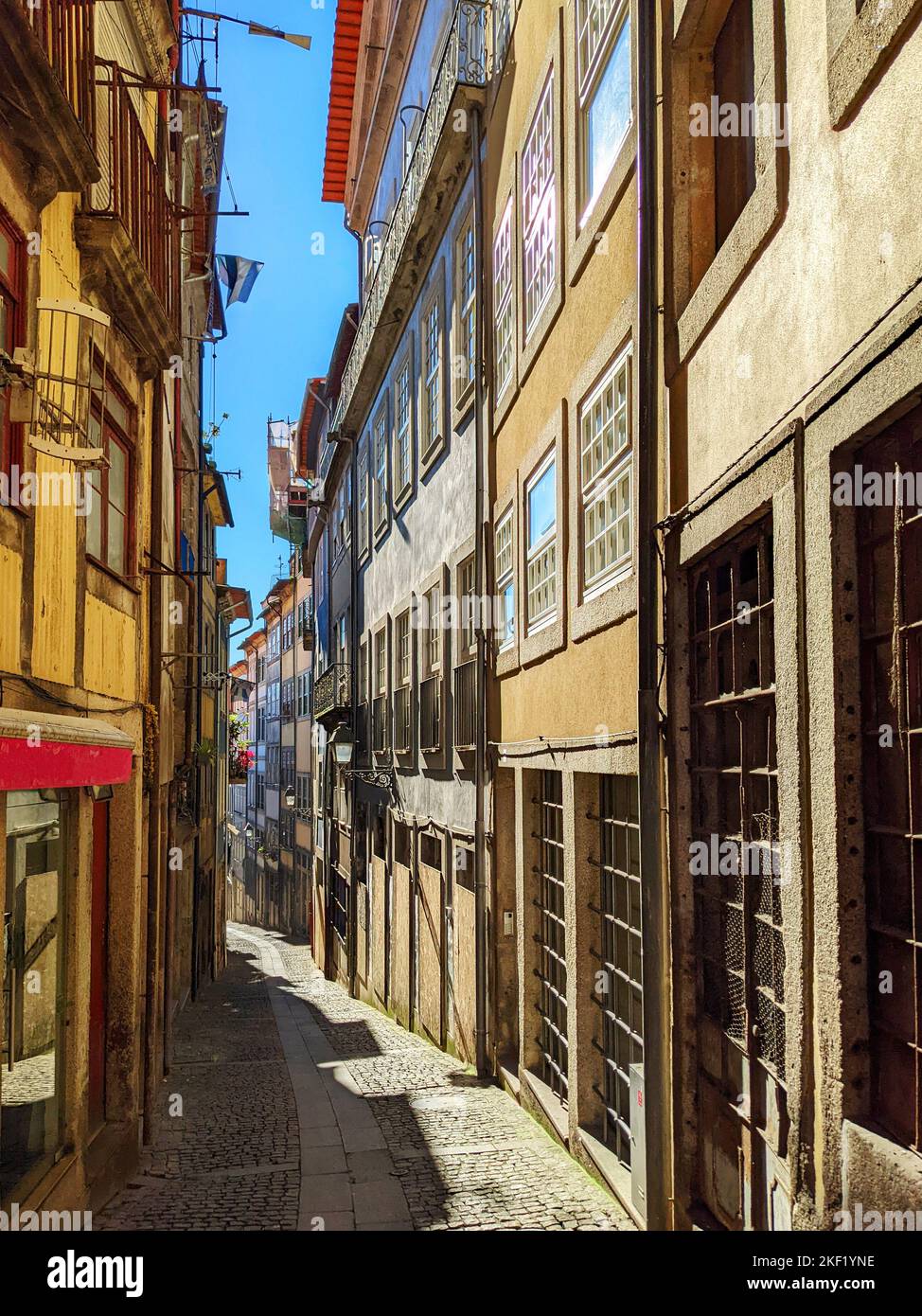 Sunshine daytime view of narrow street, Porto old town, Portugal Stock Photo