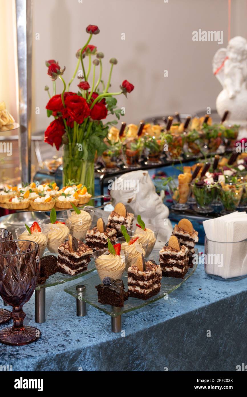 table with different desserts catering at the event Stock Photo Alamy