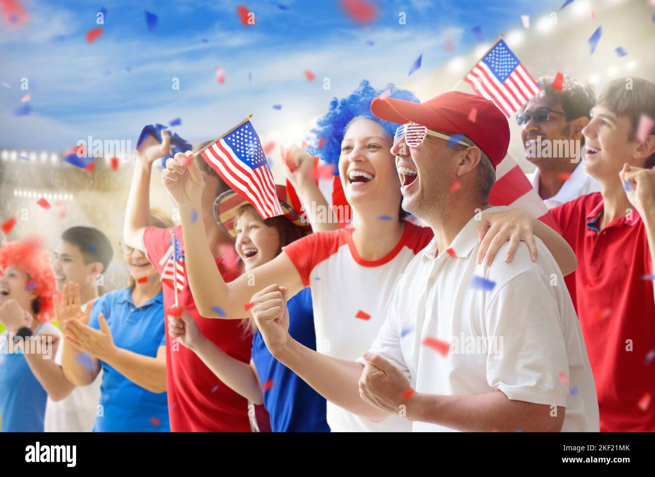 American football supporter on stadium. US fans on soccer pitch