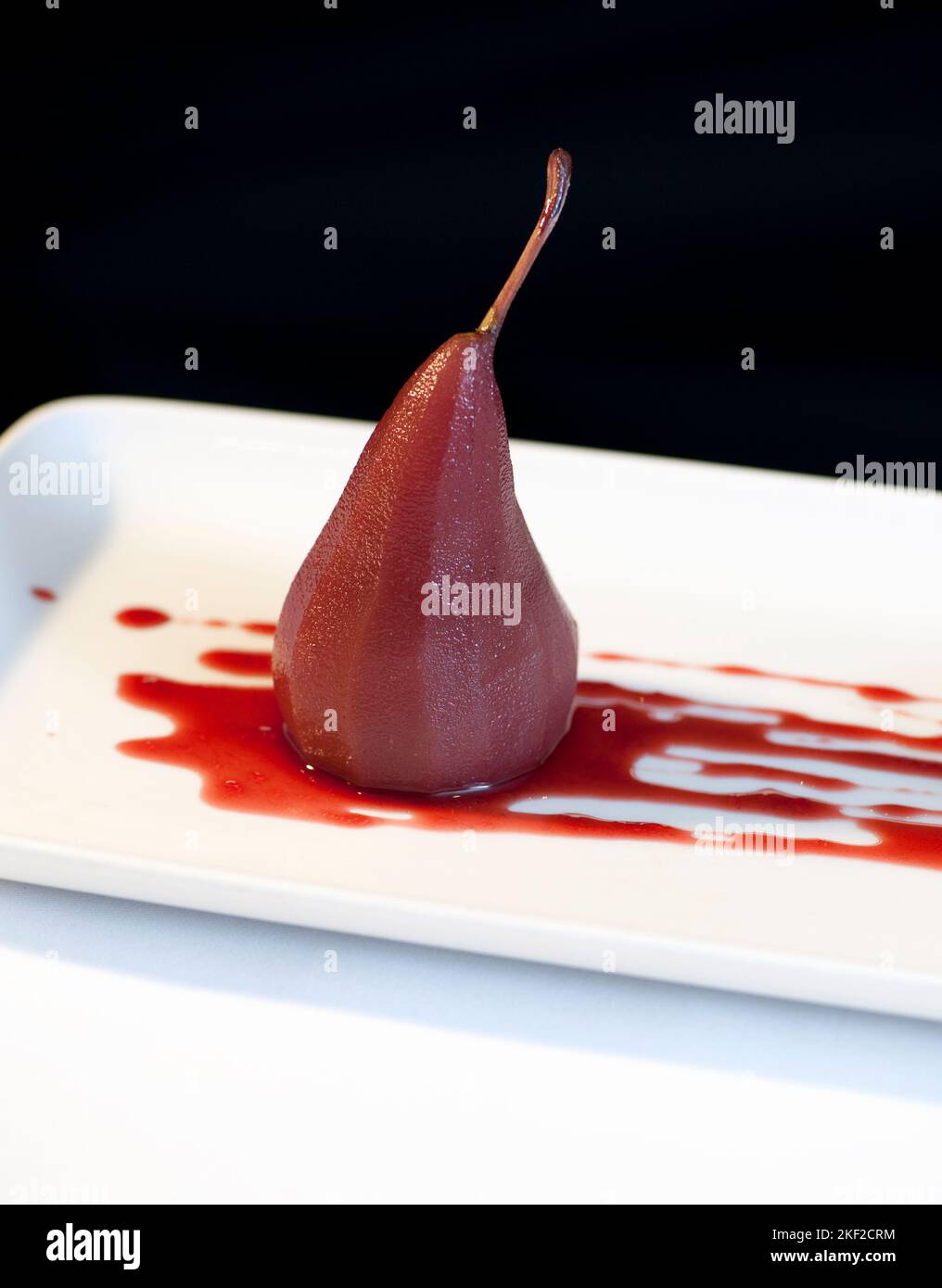 Poached Pears in Red Wine Stock Photo