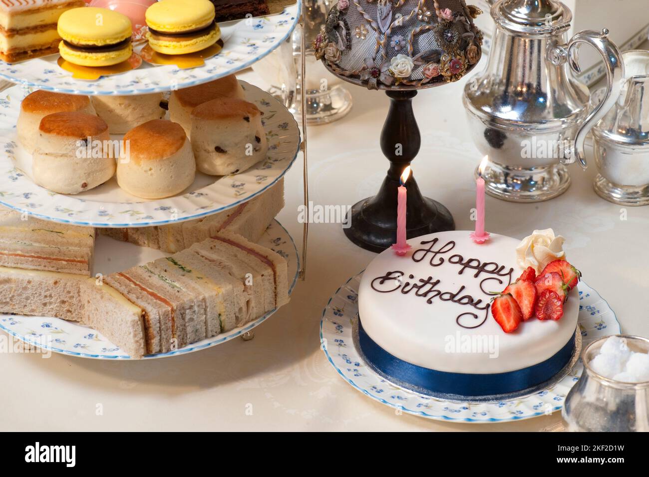 Birthday cake with fresh strawberry served during afternoon tea Stock Photo