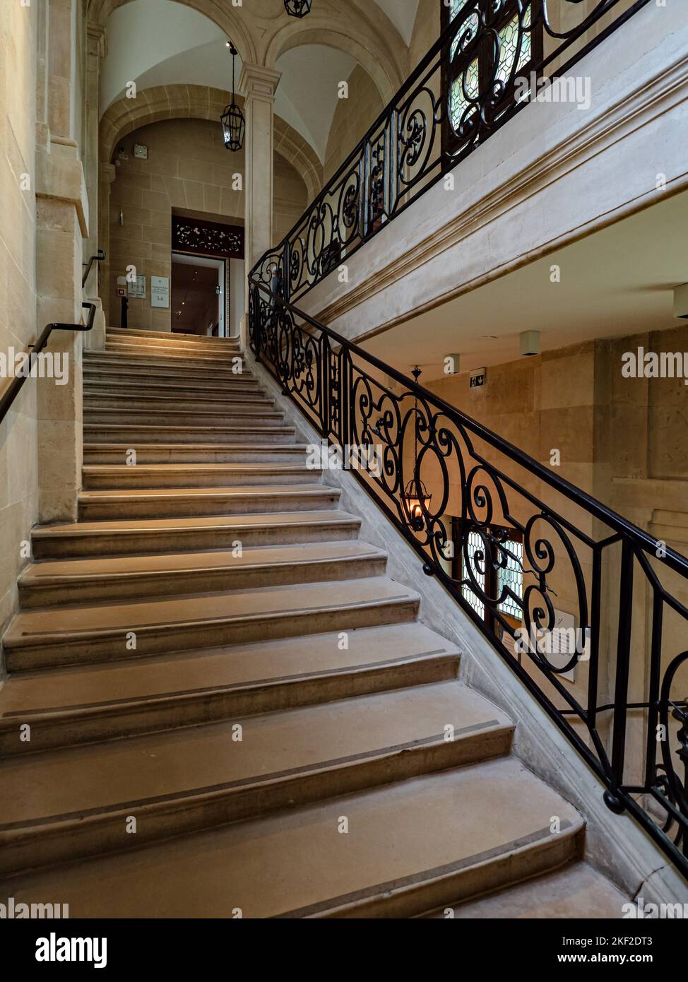Gorgeous staircase in an old mansion in Paris. The luxury of a bygone ...