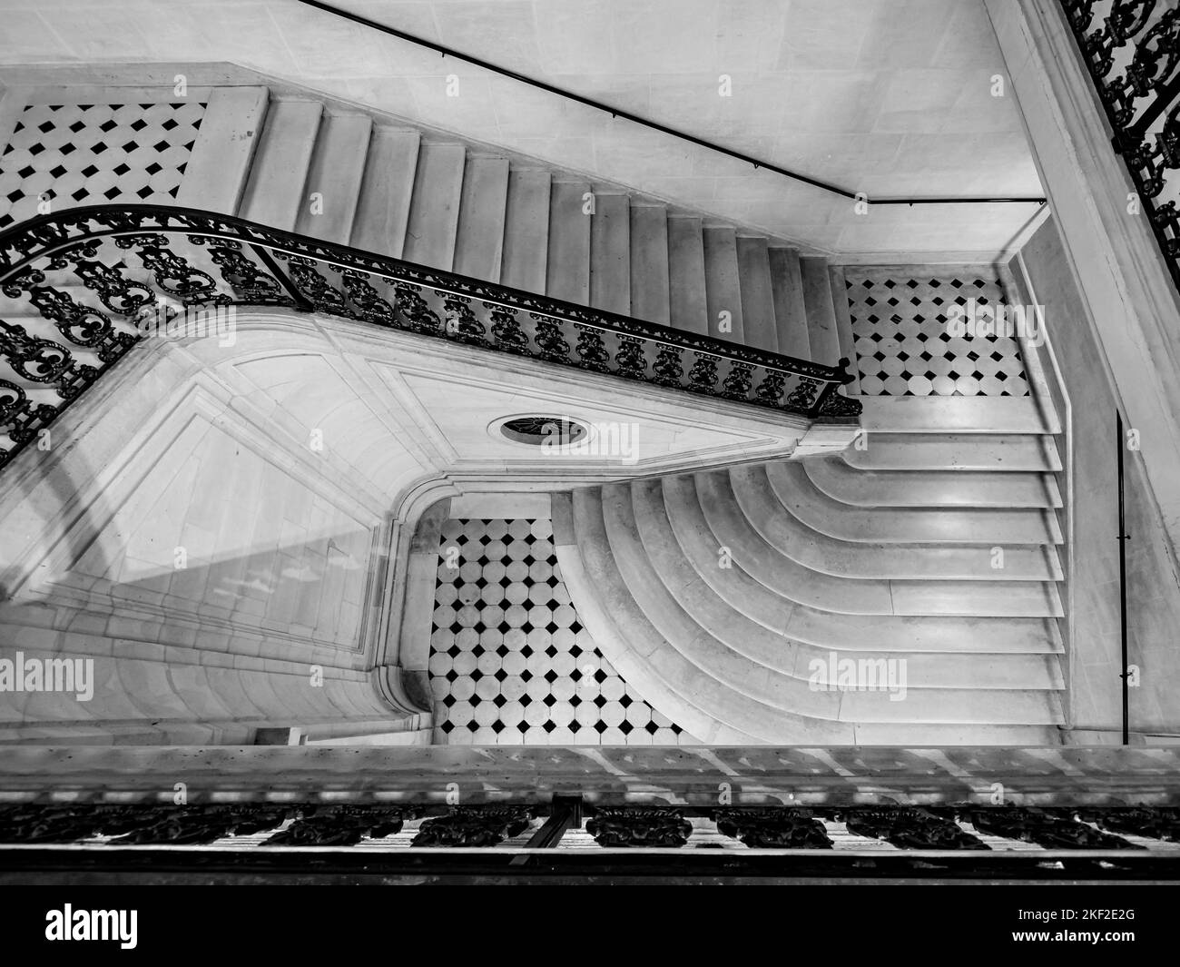Gorgeous staircase in an old mansion in Paris. The luxury of a bygone ...