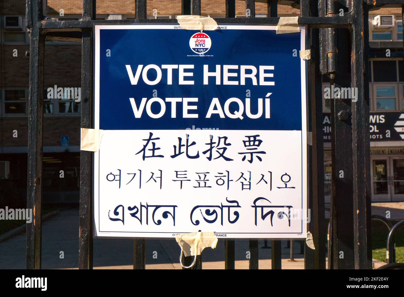 A sign in 5 languages at Francis Lewis High School, a place to vote in the 2022 midterms. In Fresh Meadows, Queens, New York. Stock Photo